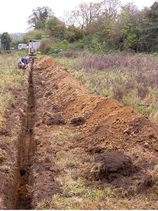 Conduit trench PV array to inverter kiosk
